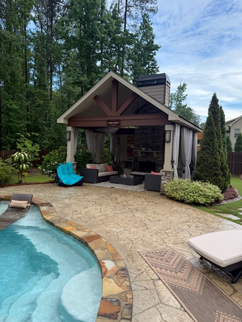 Custom outdoor living pavilion and pool built by Wright Way Services